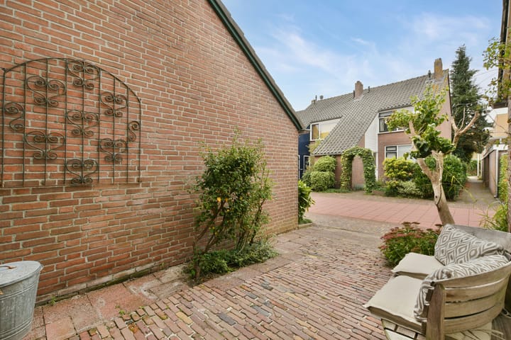 Tussenwoning te koop: de Lange Gangh 15, Muiden