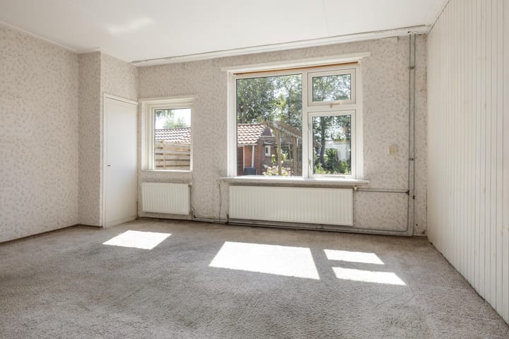 Twee-onder-één-kap te koop: Ridenbergstraat 12, Farmsum