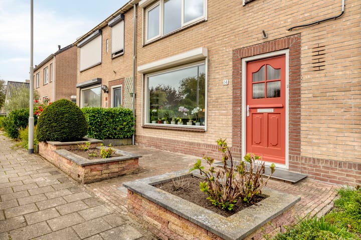 Tussenwoning te koop: Henry Dunantstraat 14, Wolphaartsdijk