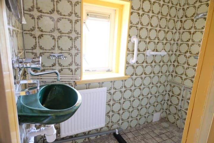 Tussenwoning te koop: Oudkerkseweg 42, Giessenburg