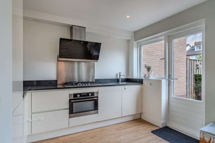 Tussenwoning te koop: Edisonstraat 29, Huizen