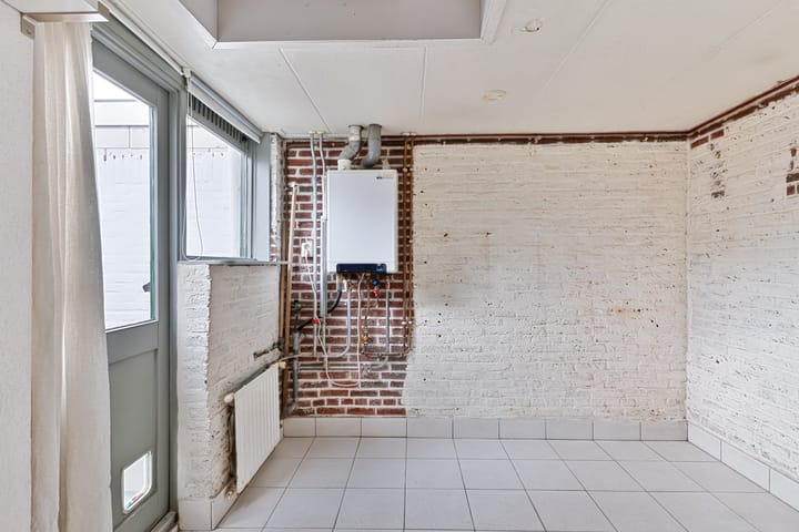 Tussenwoning te koop: Achter Nieuwstraat 13, Bodegraven