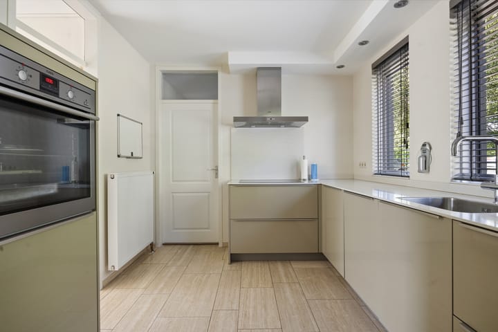 Tussenwoning te koop: De Marne 8, Drunen