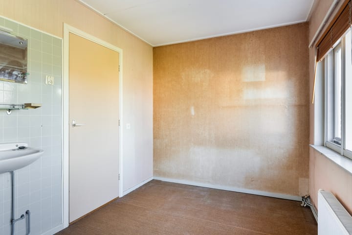 Tussenwoning te koop: Van Helsdingenstraat 5, Hurdegaryp