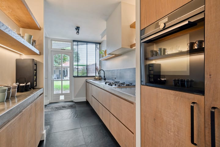 Tussenwoning te koop: Koningin Emmastraat 26, Kaatsheuvel