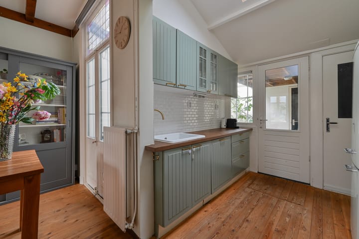 Tussenwoning te koop: Honingstraat 34, Hilversum