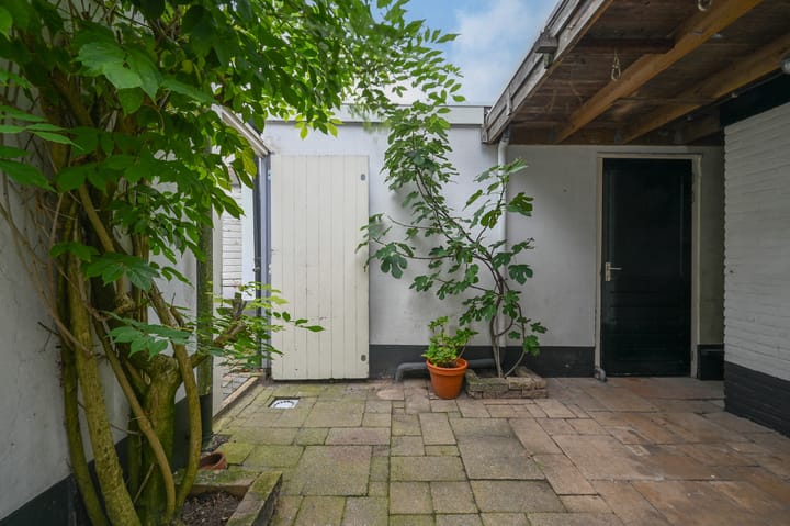 Tussenwoning te koop: Honingstraat 34, Hilversum