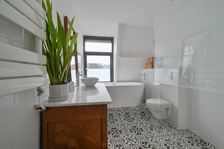 Tussenwoning te koop: Honingstraat 34, Hilversum
