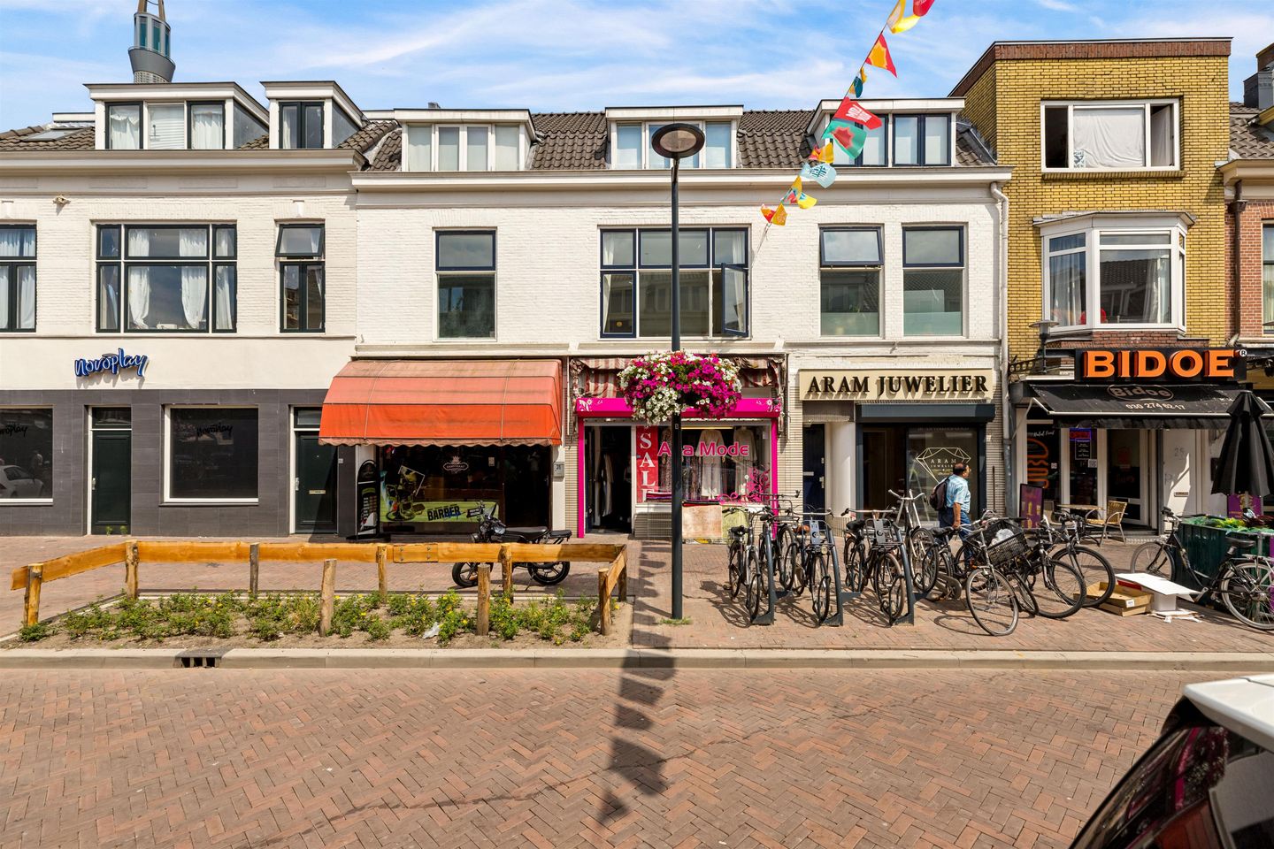 Bekijk foto 1 van Damstraat 27-31