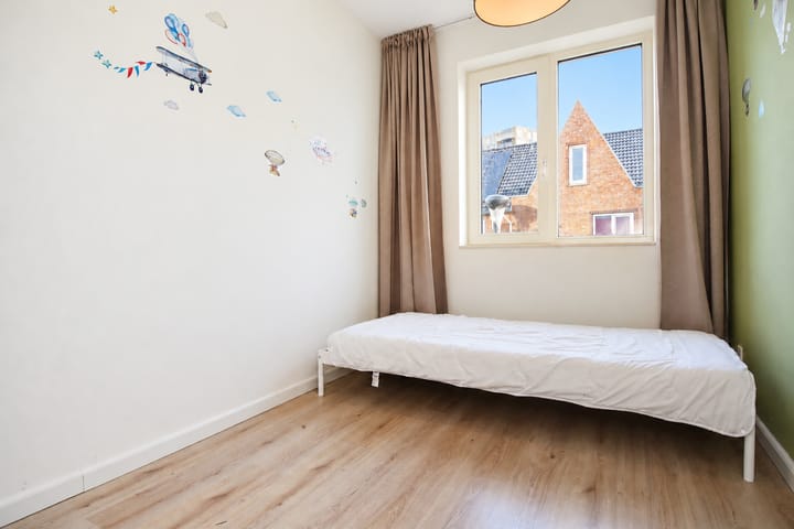 Tussenwoning te koop: Ockenburger Tientweg 4, Rijswijk (Zh)