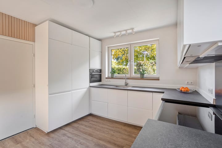Twee-onder-één-kap te koop: John F. Kennedysingel 24, Melick