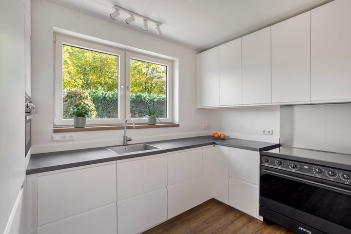 Twee-onder-één-kap te koop: John F. Kennedysingel 24, Melick