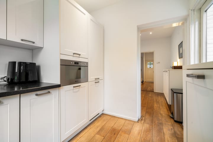 Tussenwoning te koop: Comeniuslaan 45, Bussum