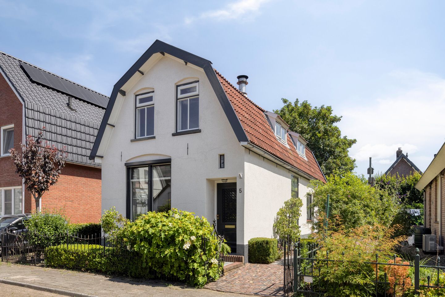 Foto 1 van Tienwoningenweg 5