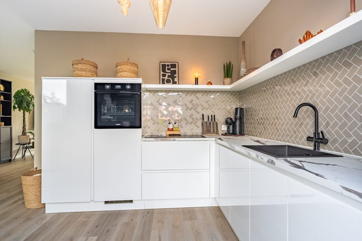Twee-onder-één-kap te koop: Nassaustraat 89, Winschoten